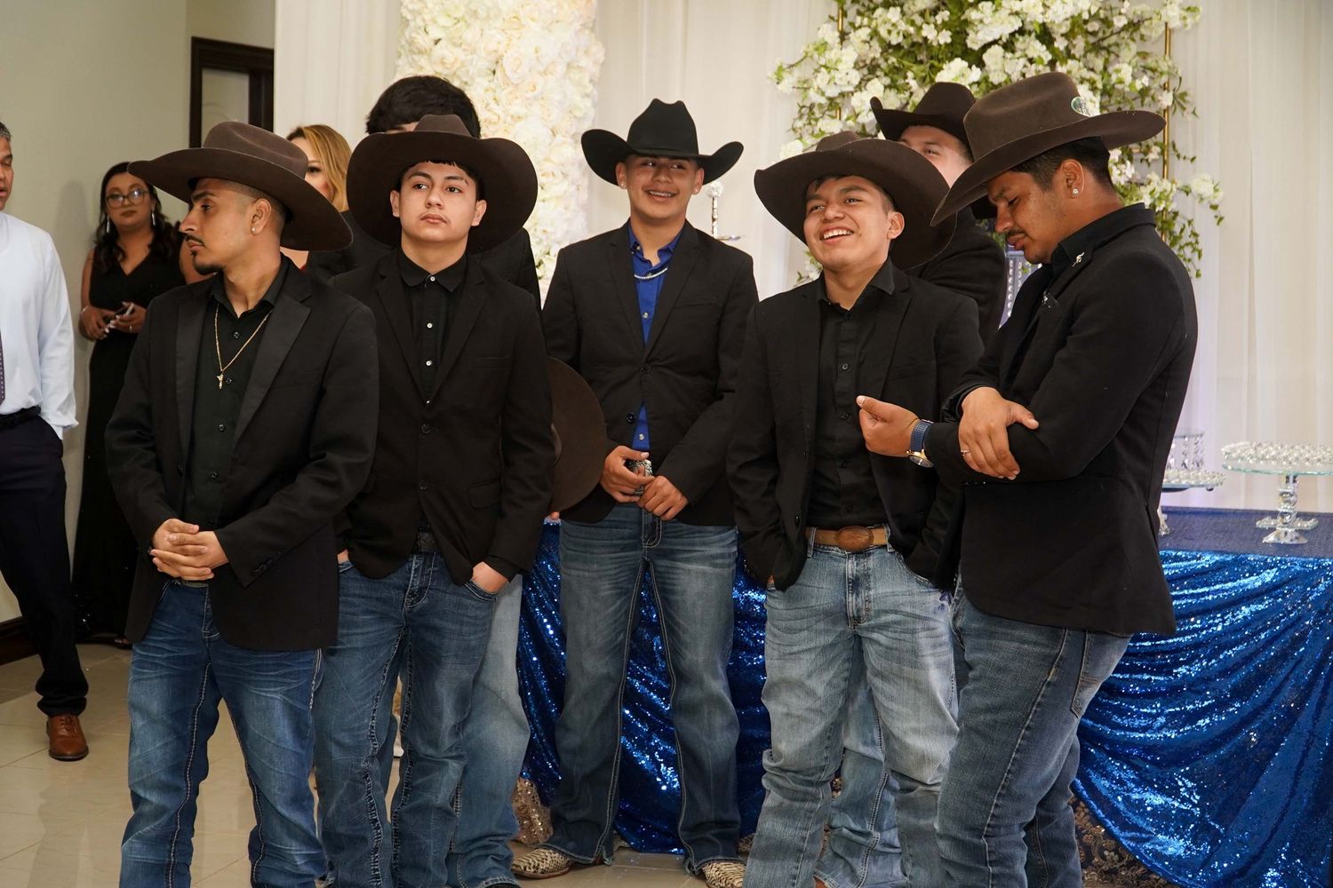 Fort Worth Quinceañero photography features Charro suits, nice boots and western photoshoot ideas for boys celebrating their quince at 15
