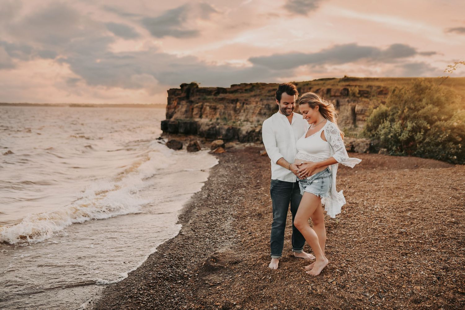 Sunset maternity photos with tall rock formations