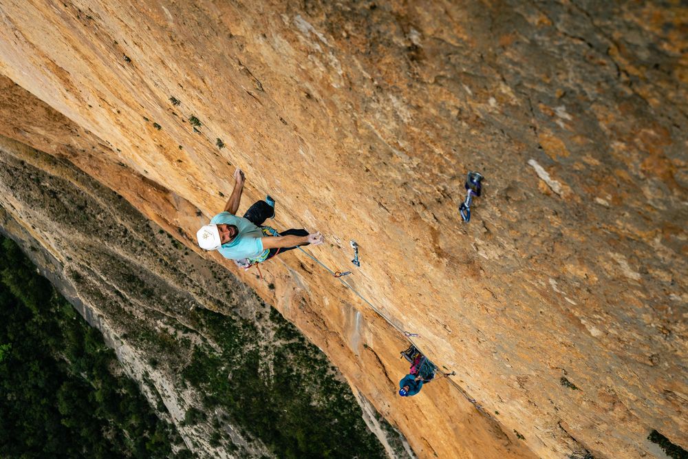 Chris Sharma working the moves on his multi-pitch project in Spain - photo Jan Virt