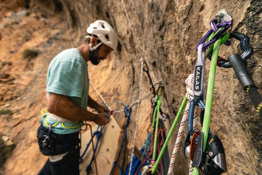 Chris Sharma preparing gear on his multi-pitch project in Spain. Photo - Jan Virt