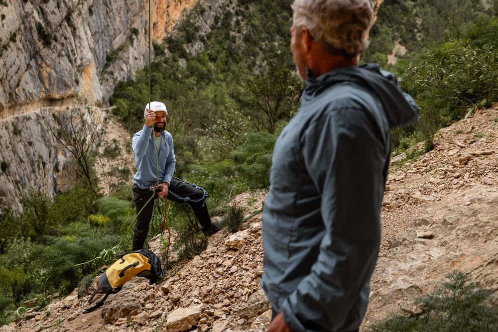 End of the day on the wall, Chris Sharma rappels down from his project in Spain. Photo: Jan Virt.