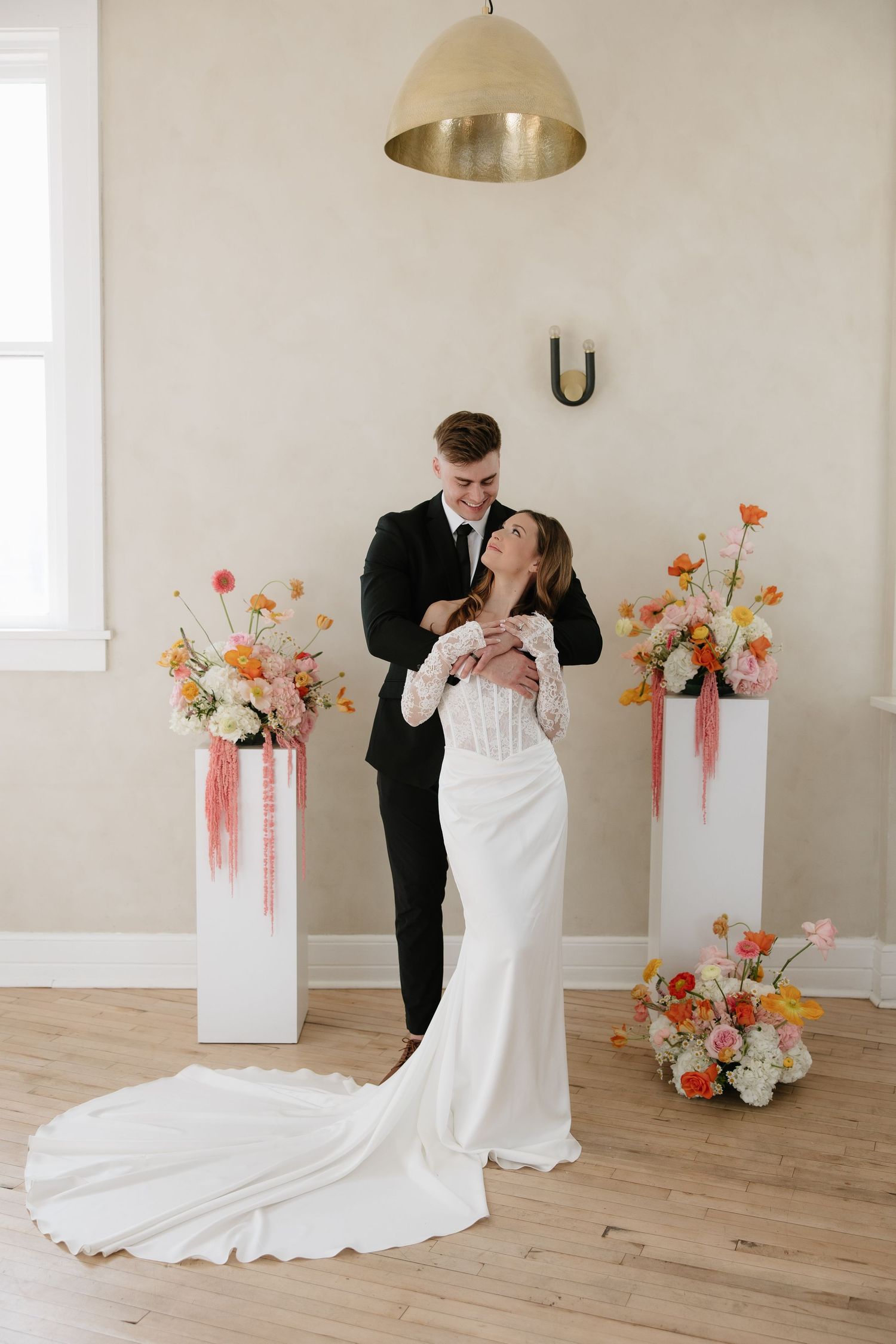 Wind-swept veil photos in black and white showing romantic wedding moments.