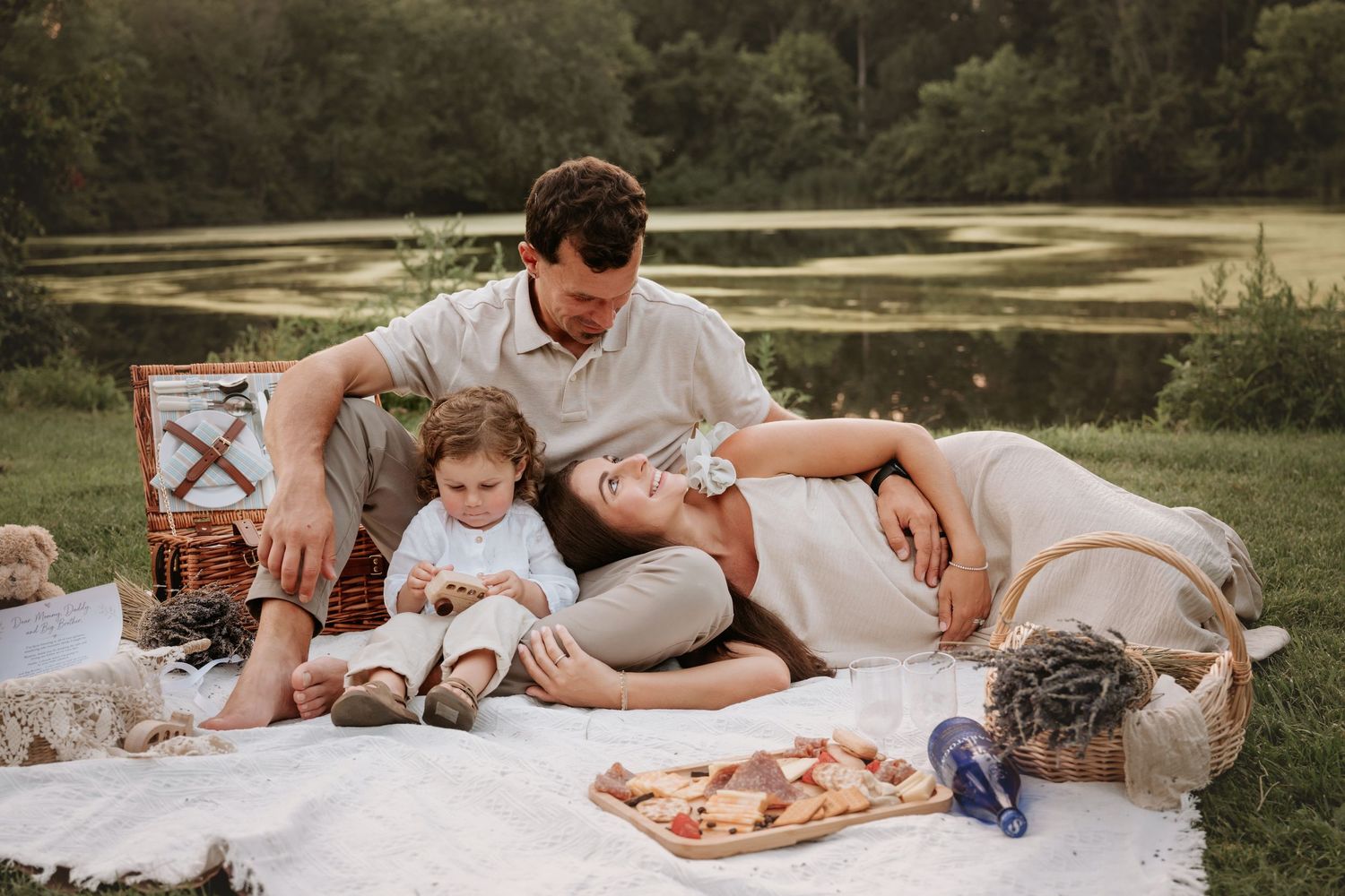 Family relaxing together during an outdoor lifestyle family photography session in New Jersey.