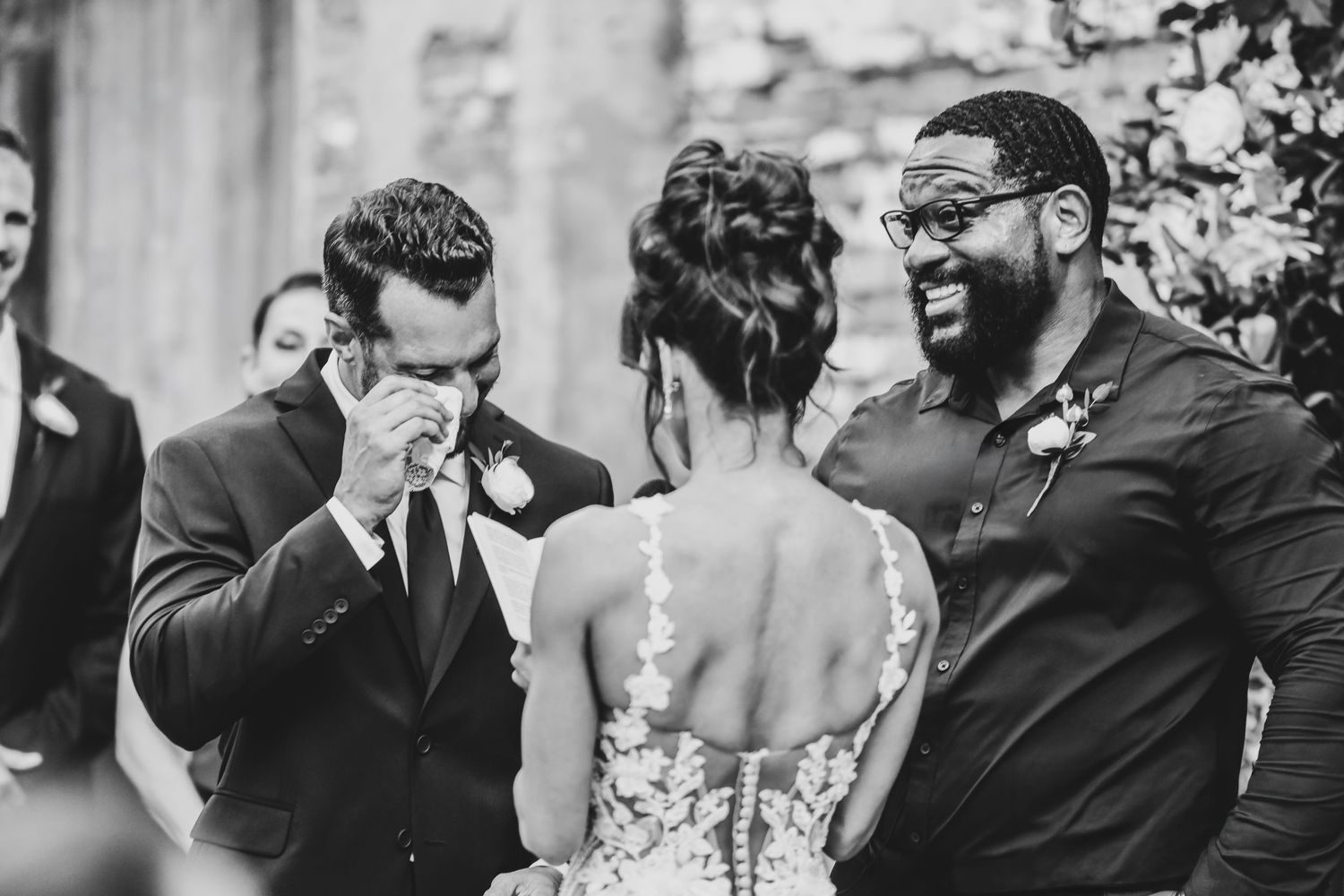 Emotional wedding ceremony moment between Megan and Joel