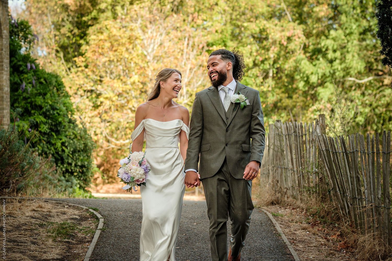A series of black and white wedding photos showing a bride in a ballgown and guests at an elegant indoor reception.