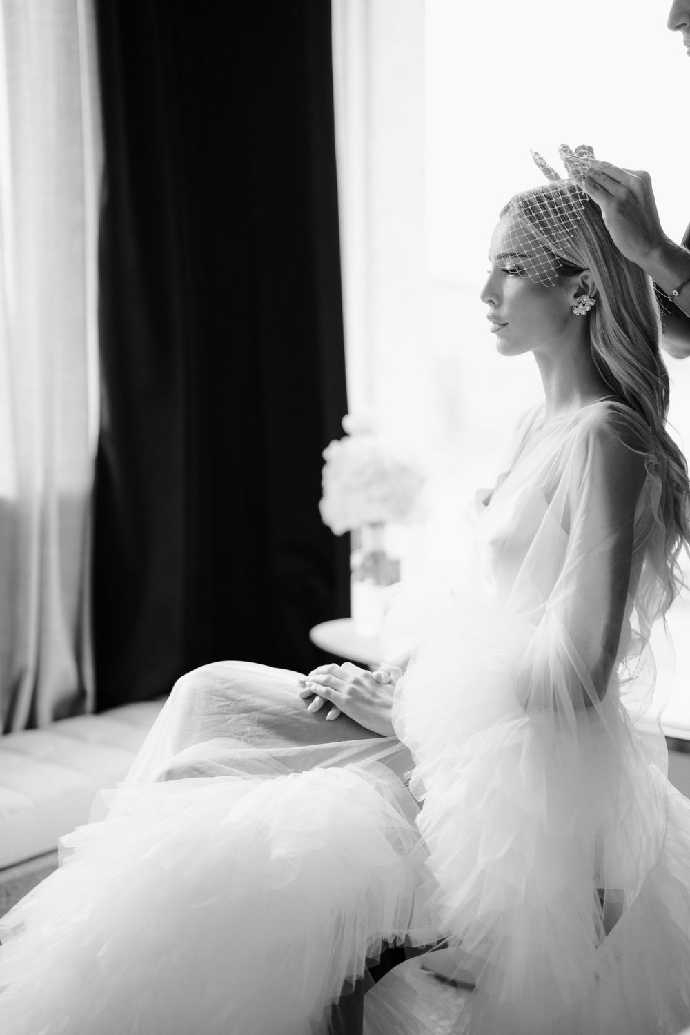 Series of ethereal bridal portraits showing flowing white dress and veil in soft natural light. Photoshoot by Venice Photographer Alina Indi