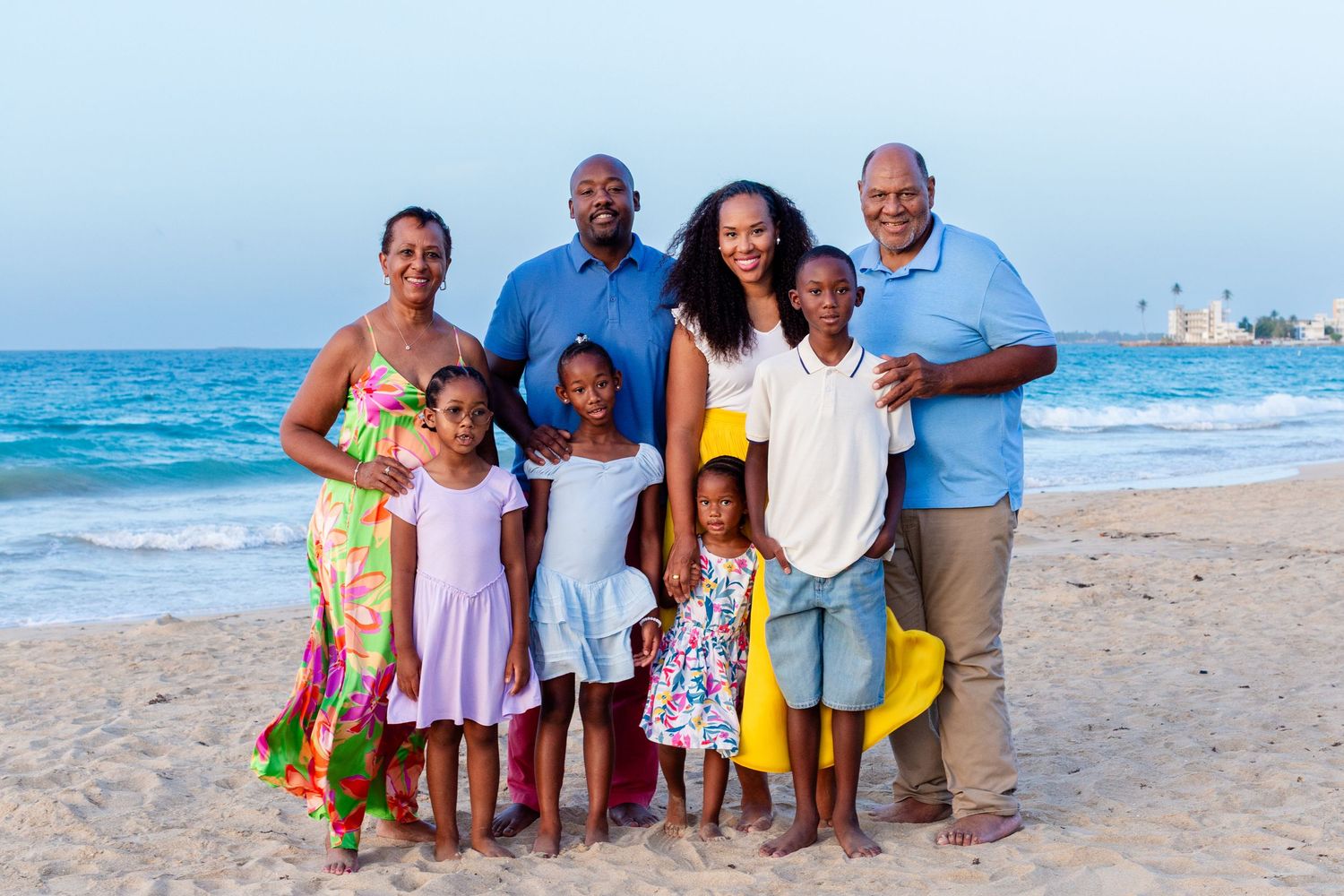 Family portrait. Mom, dad, four kids, and grandparents on the beach in Isla Verde, Carolina, Puerto Rico.
