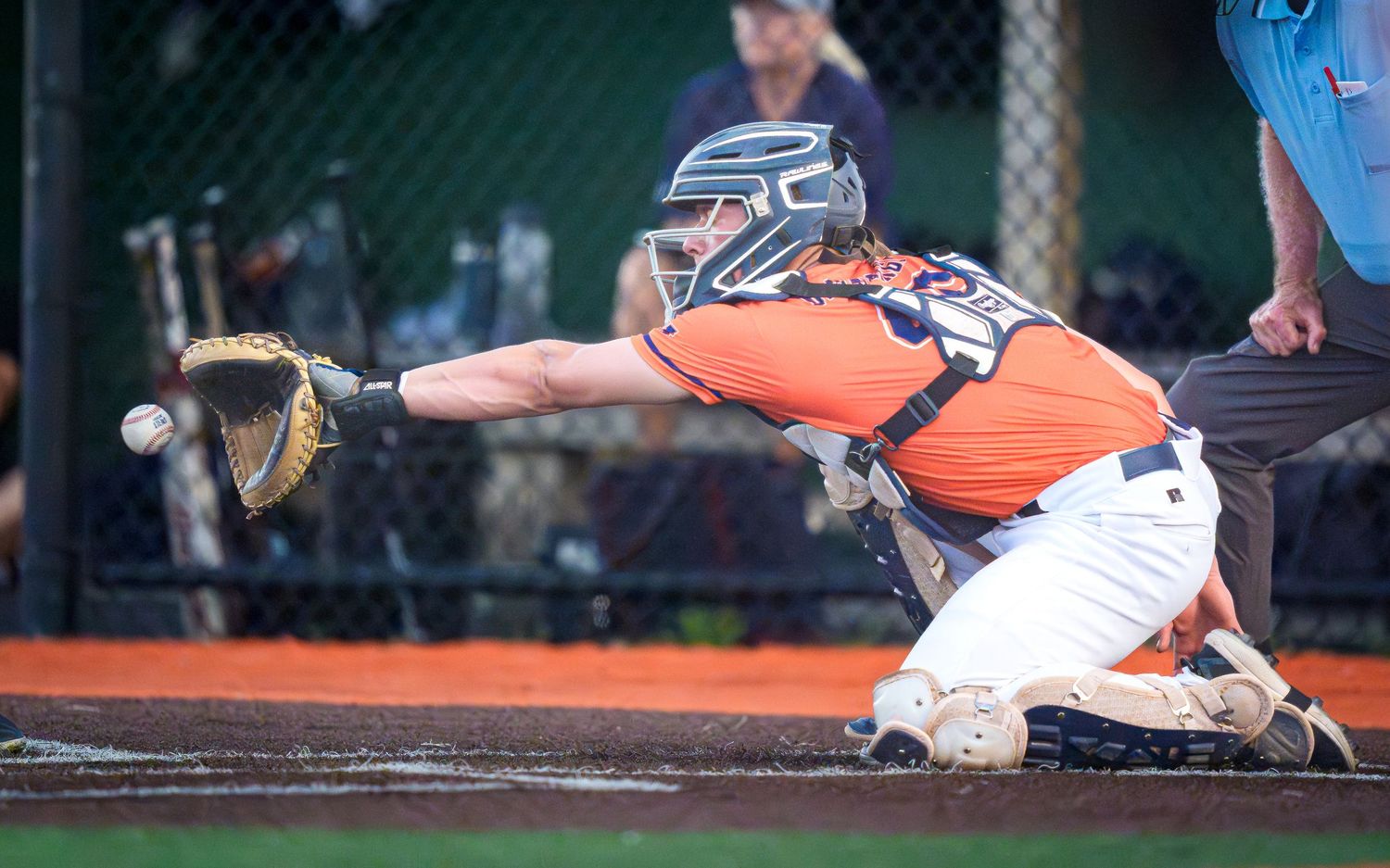 Hershey catcher blocking a pitch in the dirt against Palmyra by Deanna Fox, SportsFox Photography, Hershey PA