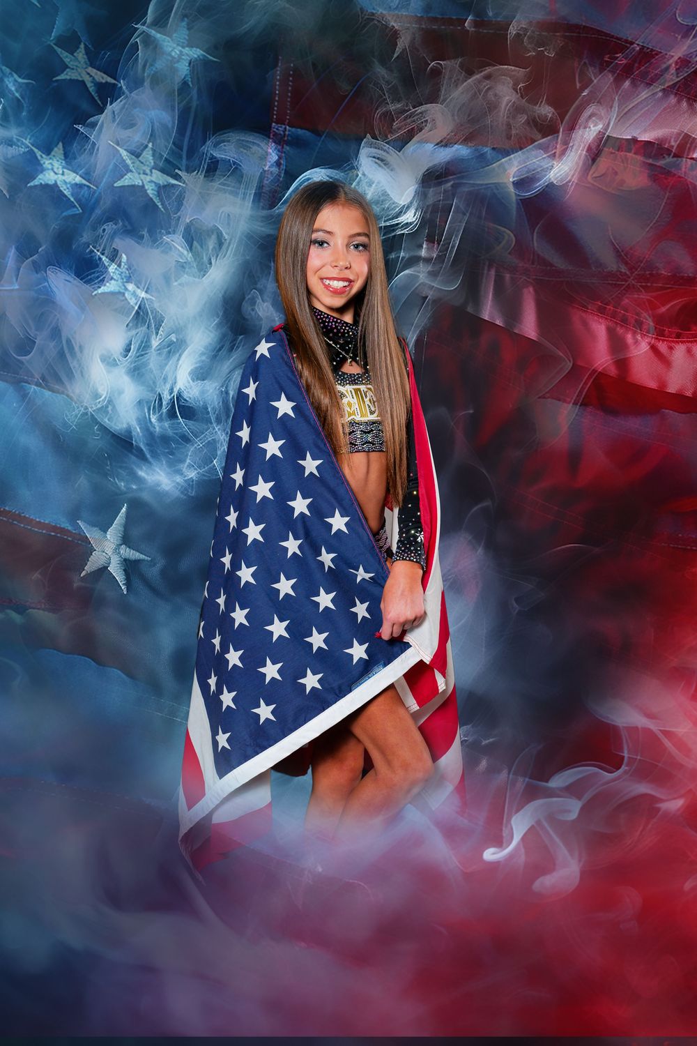 A young woman wrapped in an American flag poses dramatically against a smoky patriotic backdrop.