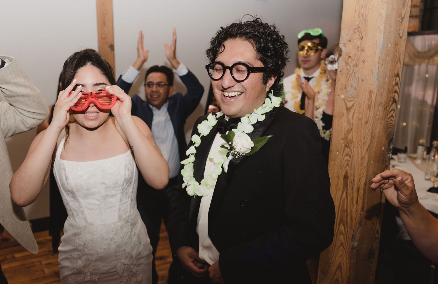Wedding guests celebrating on the dance floor at The Maxwell Room in Nashville.