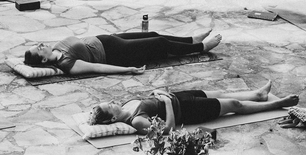 Yoga poses captured with wellbeing photography on wellness retreat