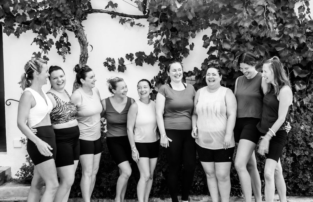 Group of ladies at wellness retreat, photography capturing a wellness retreat
