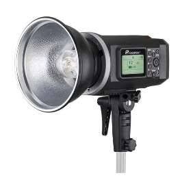 Professional photography studio setup with Godox softboxes, octaboxes, beauty dish, and light stands on white backdrop.