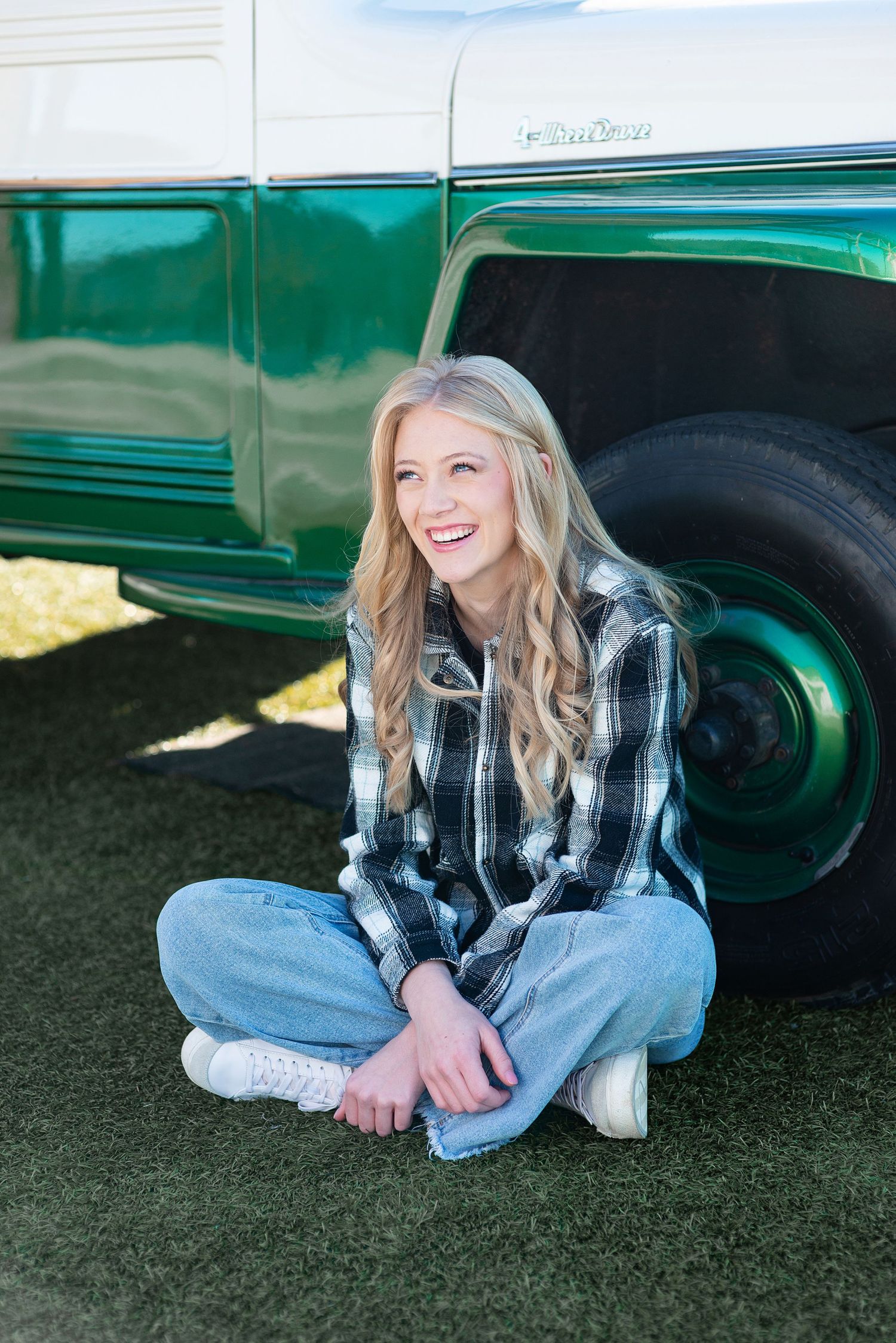 High school senior girl portrait beside a vintage truck