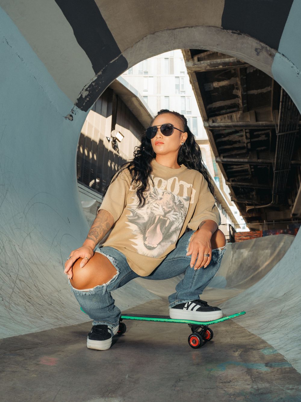 Close-up sequence of skateboarding trick in progress showing detailed foot and board movement on curved concrete surface.