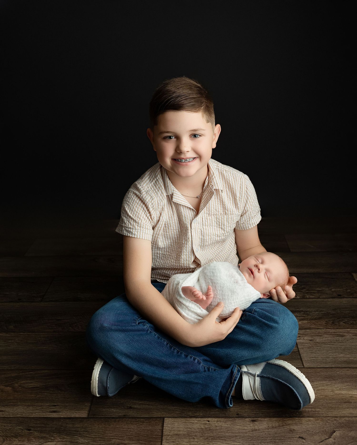 Brother holding newborn. Greenville sc newborn photographer, Easley sc newborn photographer, Greenville sc newborn photos