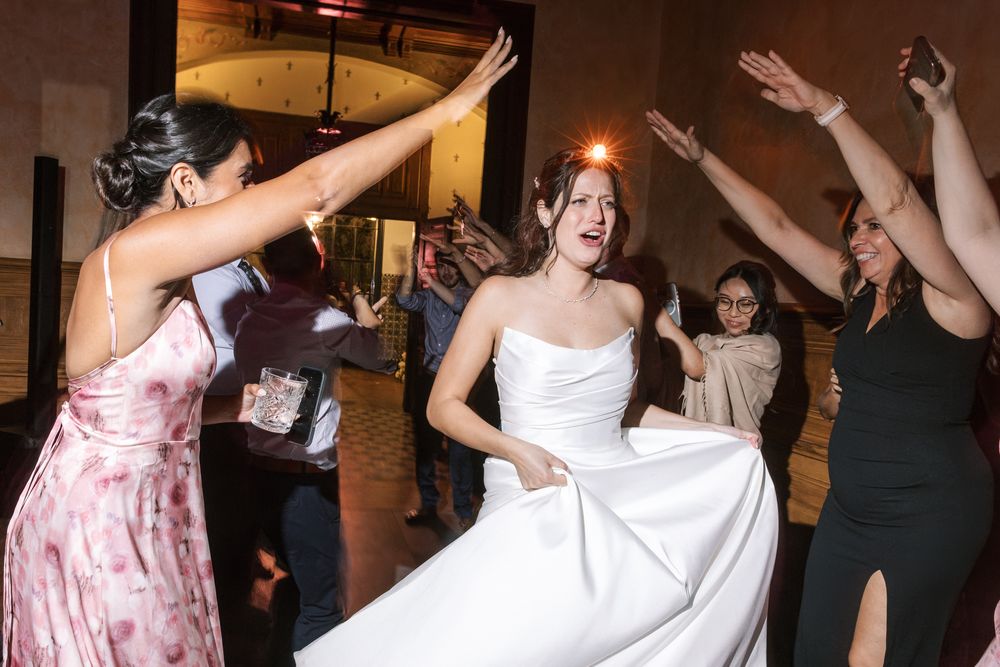 Wedding guests enjoying music and dancing at reception in Portugal