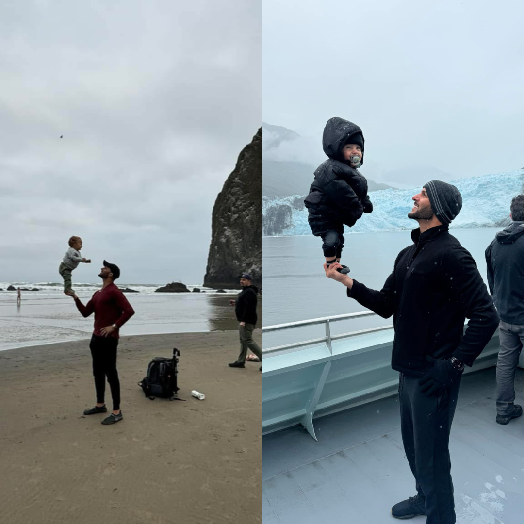 father and sun being photographed at the beach