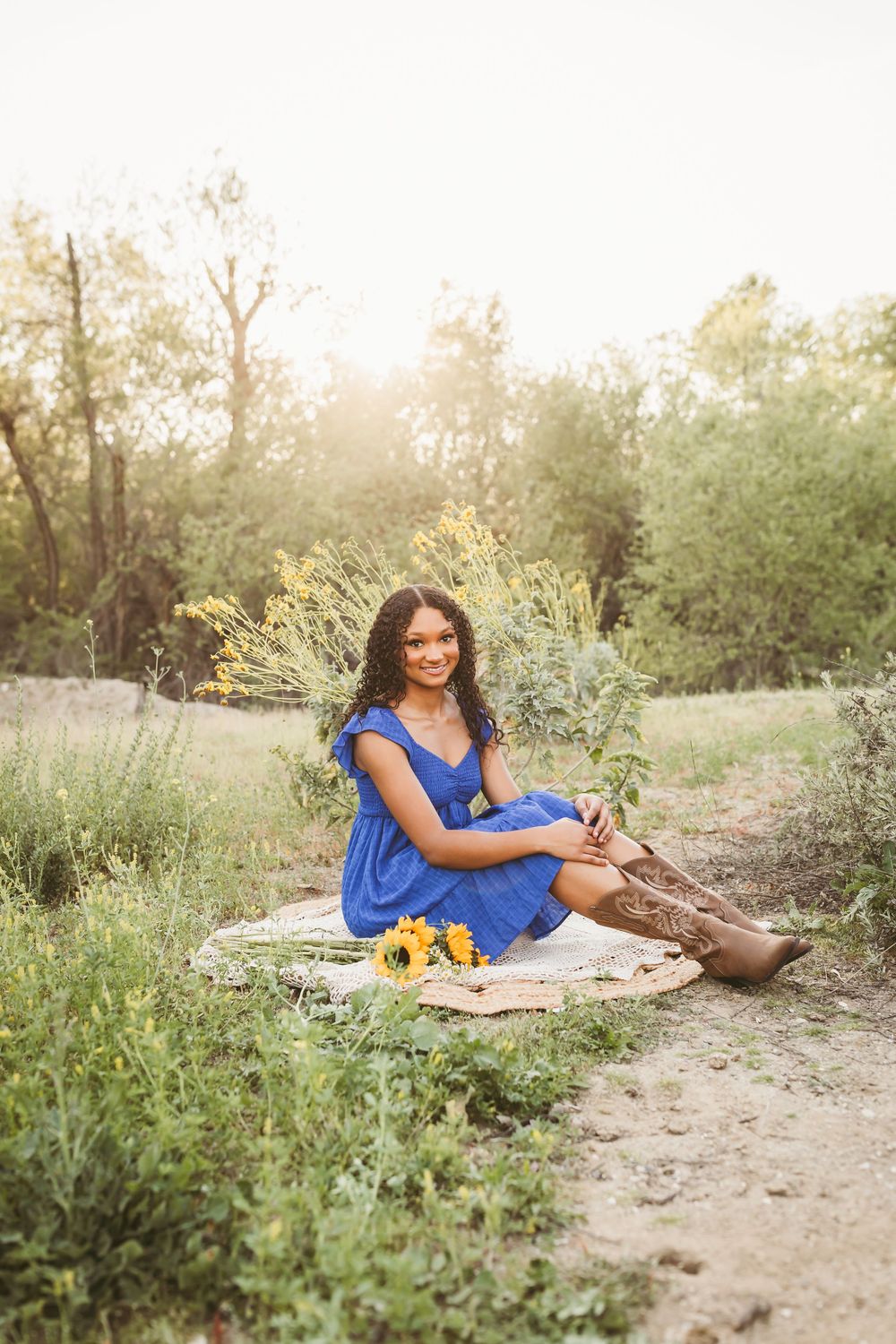senior girl blue dress and cowgirl boots outfit for senior photos in redlands ca