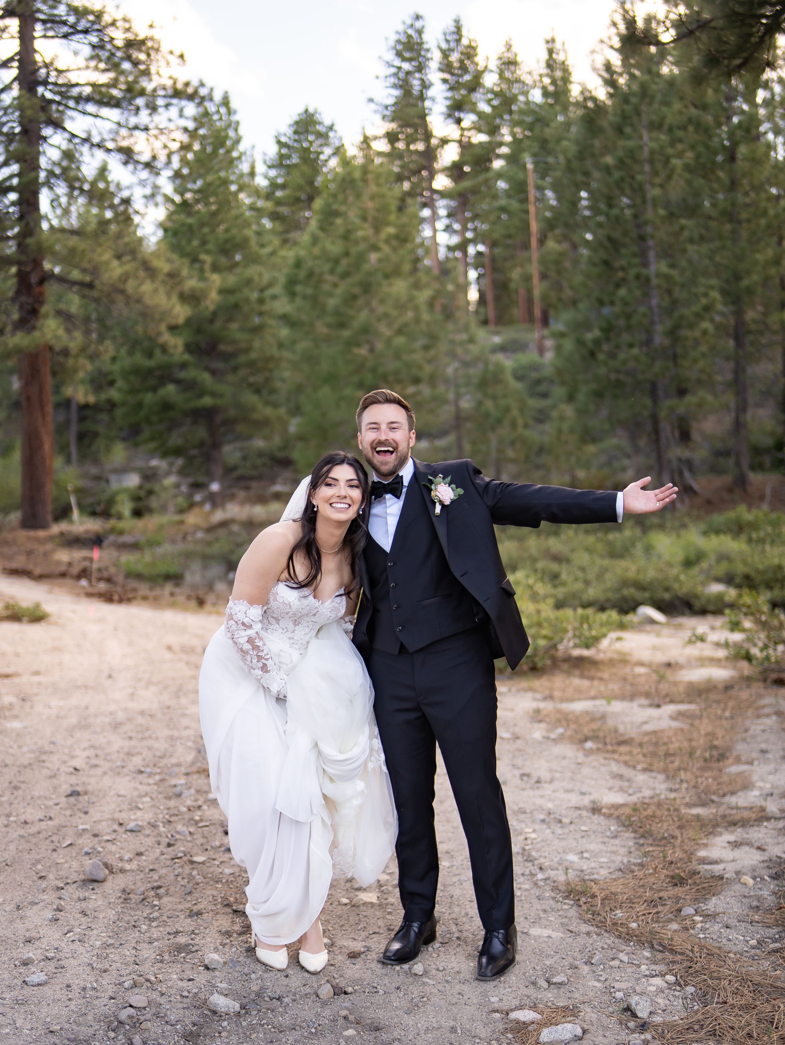 A romantic forest photo session with pine trees creating a natural outdoor backdrop.