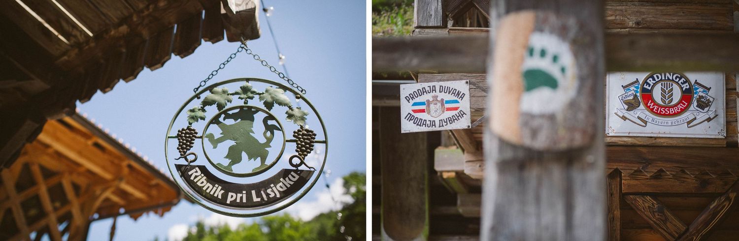 Decorative signage and vintage emblem details at a rustic outdoor venue.