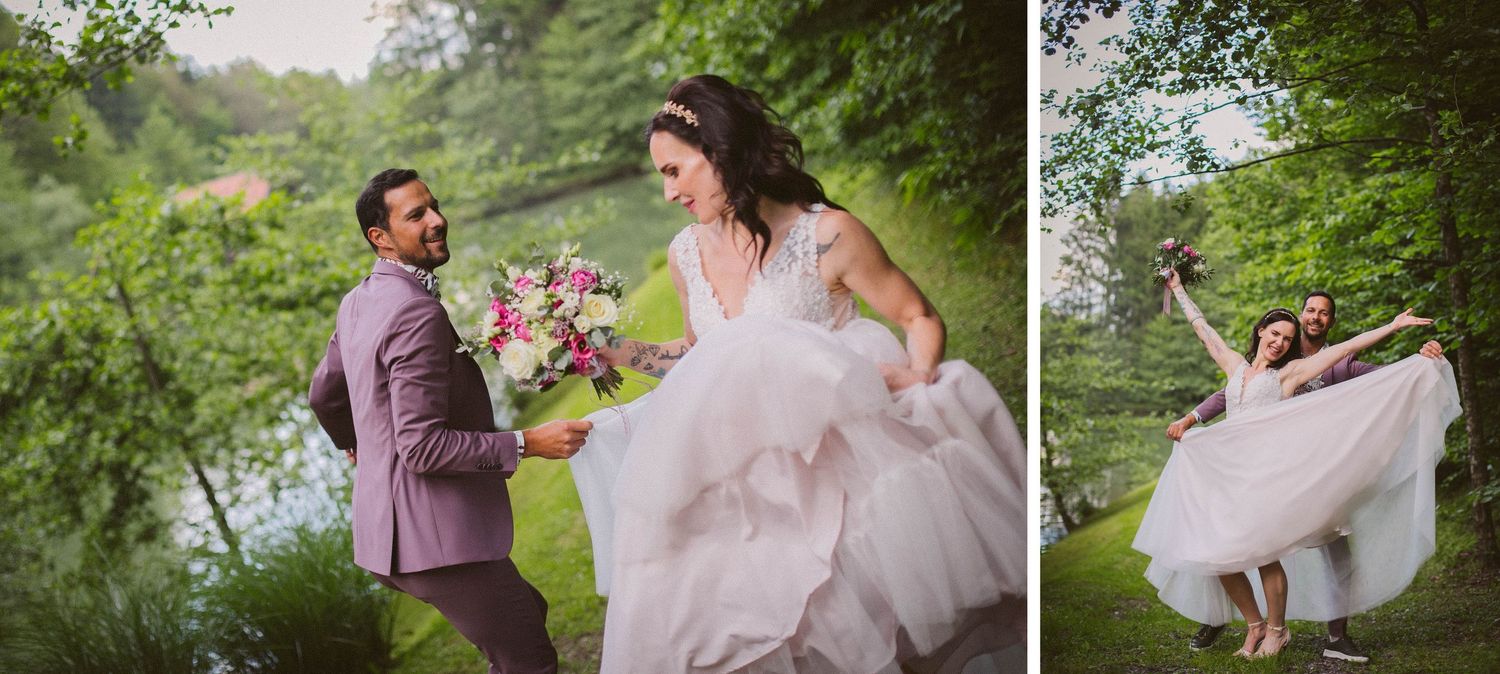 A couple celebrates their wedding day with playful poses in a garden setting.