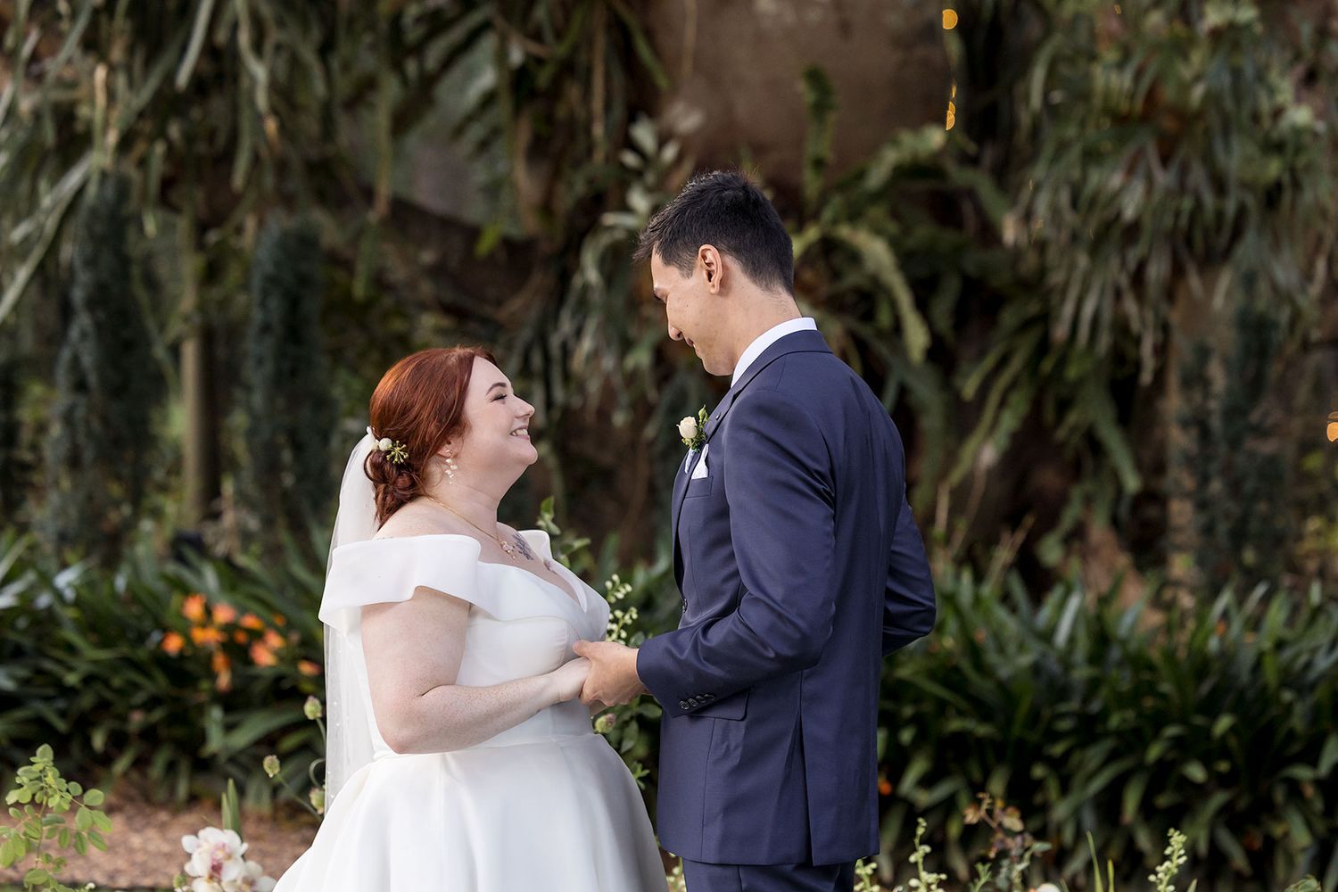 Bride and Groom share a moment during their wedding vows at their outdoor ceremony at Gabbinbar Homestead in Toowoomba Queensland.