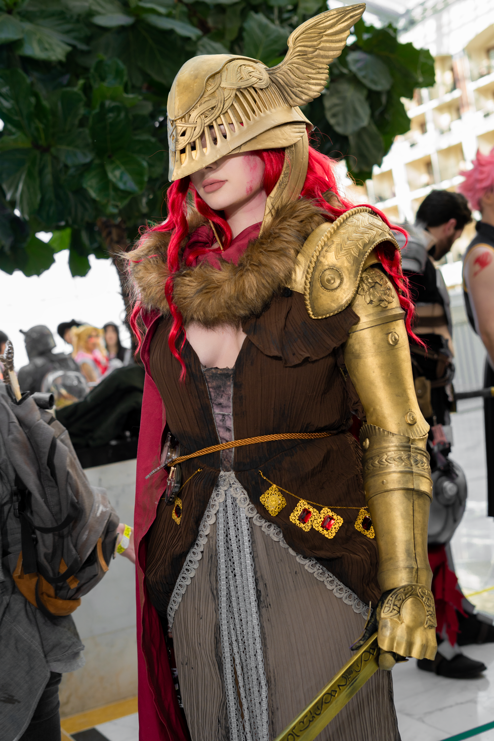 Malenia, Blade of Miquella from Elden Ring set in glowing light in the Katsucon Halls