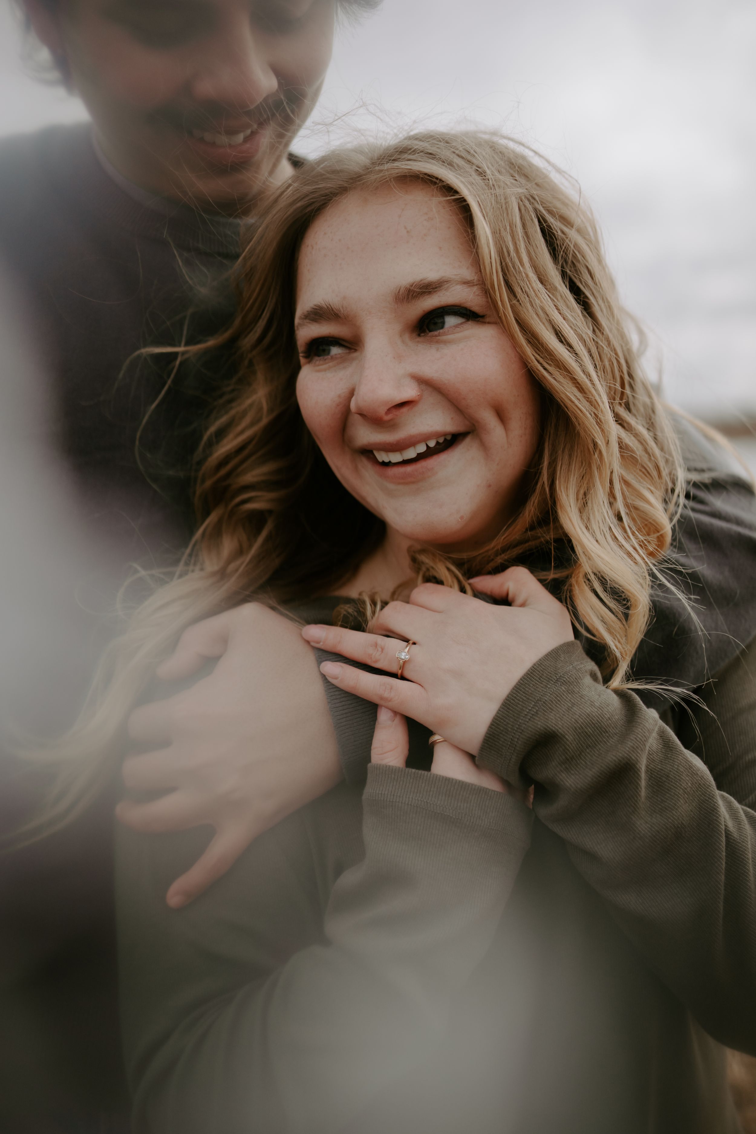 Couple sharing intimate playful moments together in a series of candid shots.