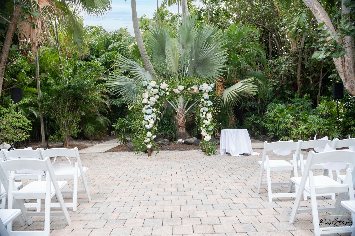 Bride and groom share a kiss by the marina at Bahia Mar – captured by luxury wedding photographers in Florida.