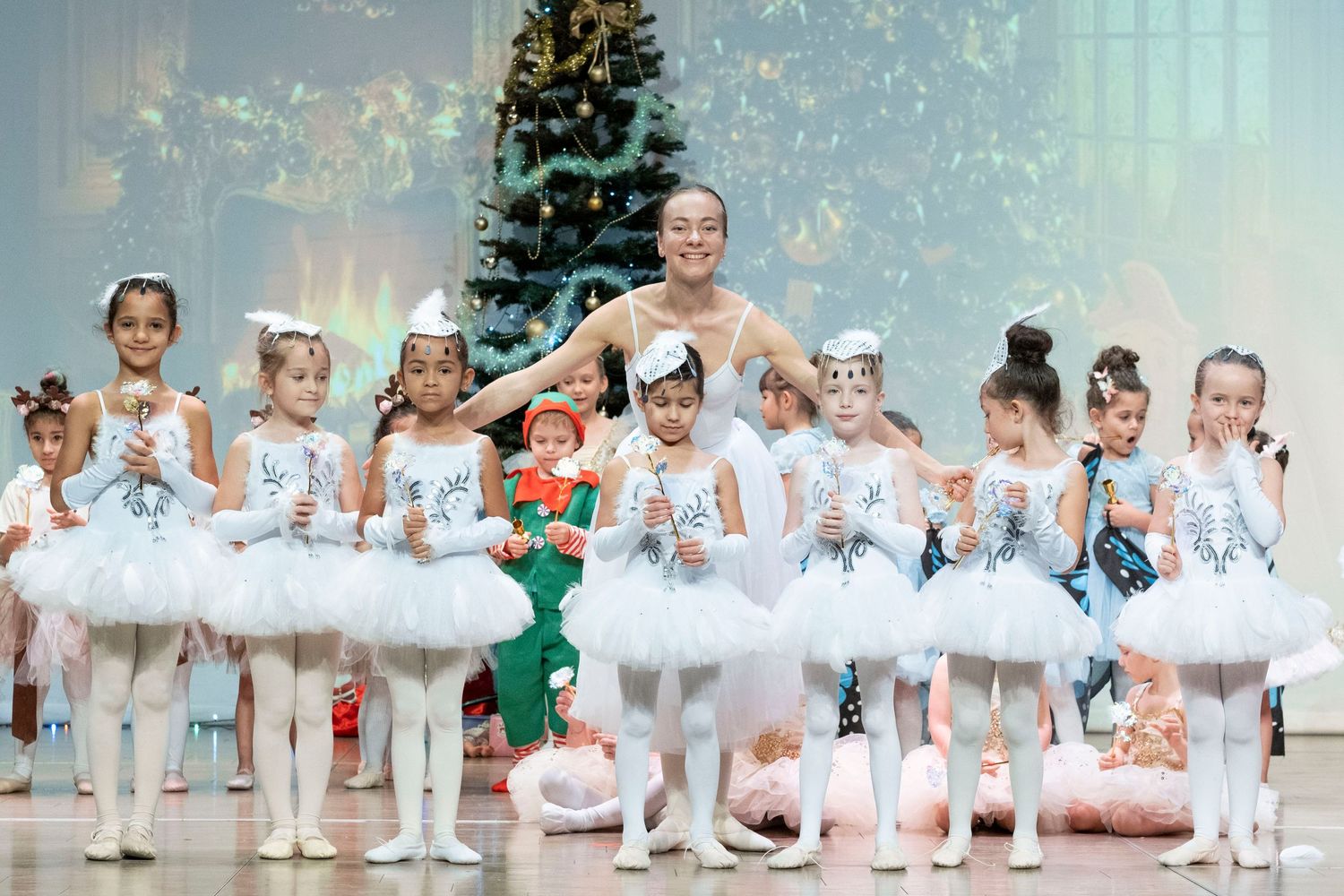 Close-up of ballet shoes and tiny feet during a Dubai kids recital photoshoot