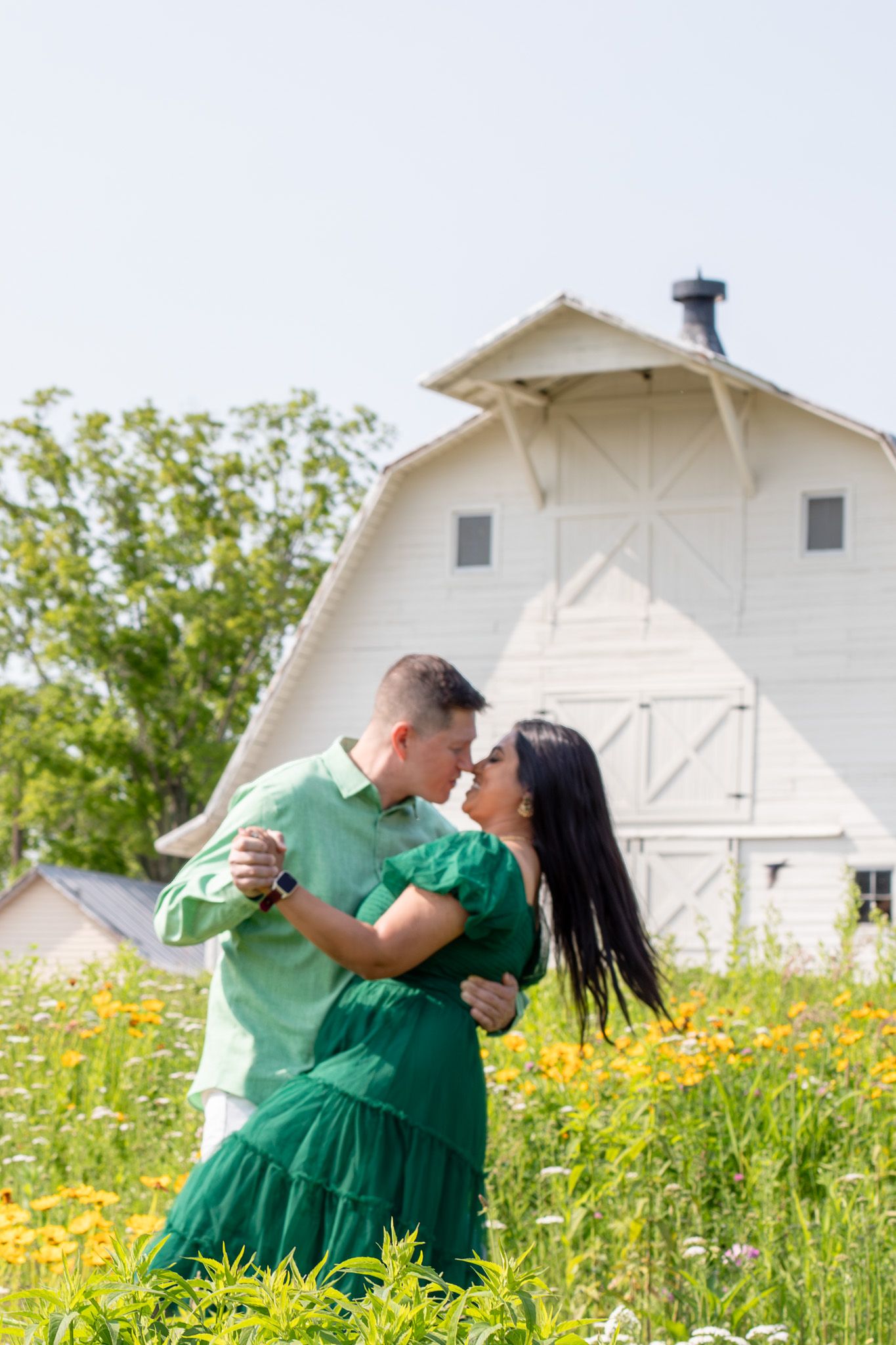 Couple session at Cincinnati farm wildflower field with luxury styling and professional outdoor portraiture for high-end clients
