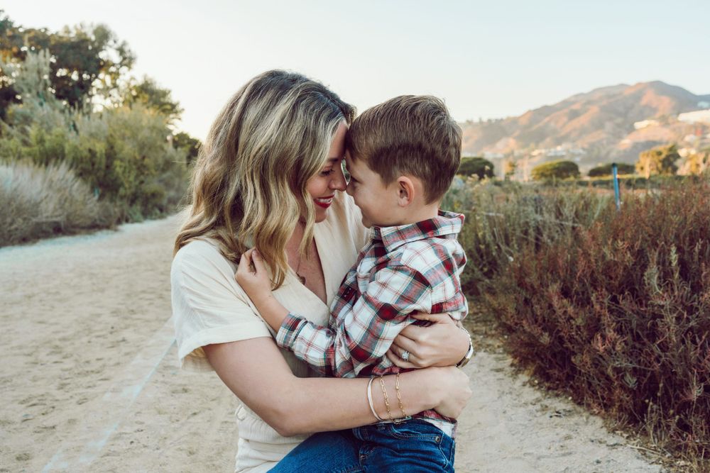 Mother with her son in the mountains
