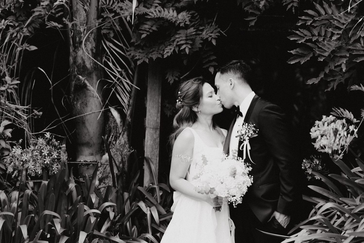 A wedding photo of a couple in an intimate moment captured by Apertured Media Auckland Wedding Photographer