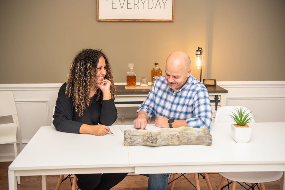 A cozy home interior scene with white decor and a sign reading 'EVERYDAY' on the wall during their business branding session in columbia, sc