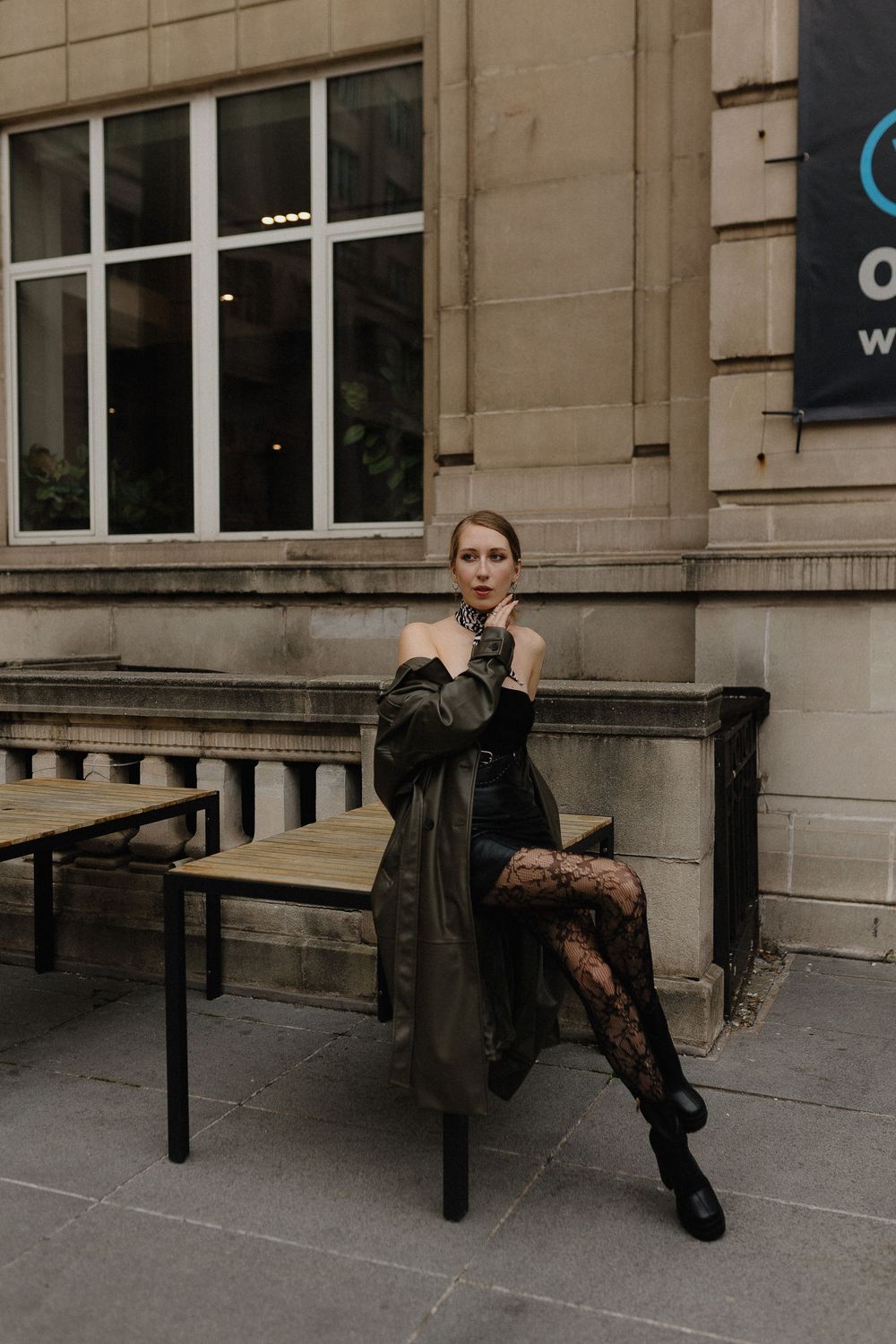 Artistic fashion portraits on a stone bench showing edgy street style with leather and lace details.