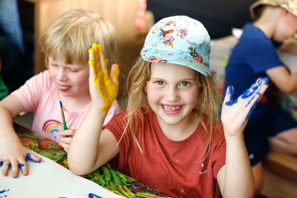 Children participating in a fun indoor learning activity.