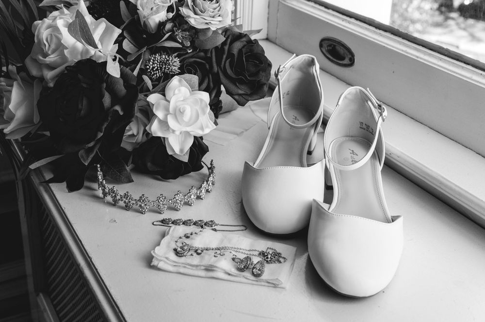 Black and white photo series showing different angles of a white ceramic teapot sitting on a windowsill.