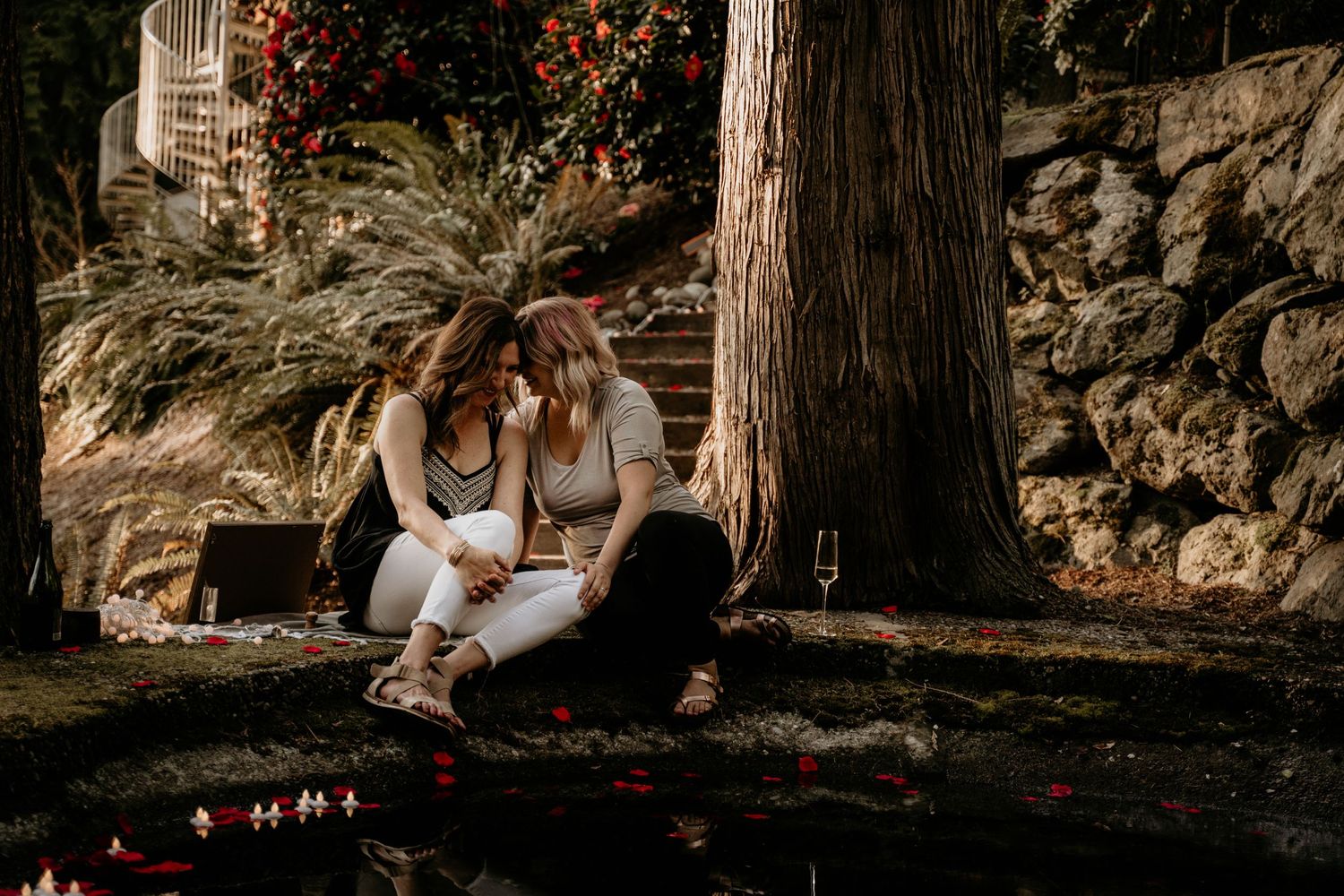 Newly engaged women sharing a moment by the pond in Buckley, WA.