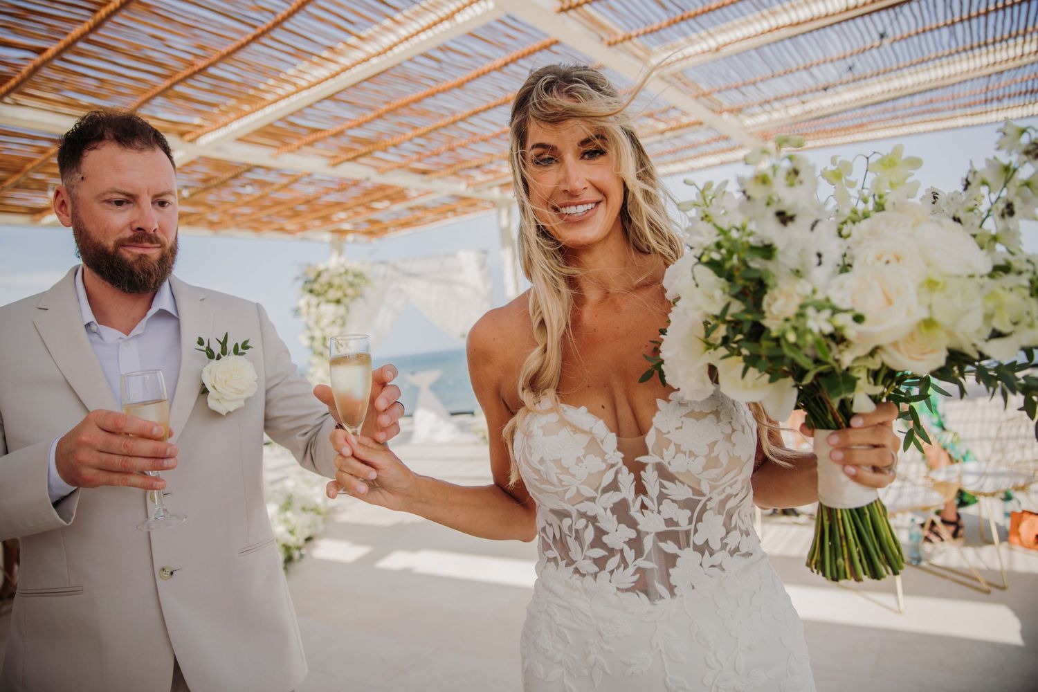Wedding party enjoys cocktails and celebrations Dreams Sapphire Riviera Maya Wedding Photography