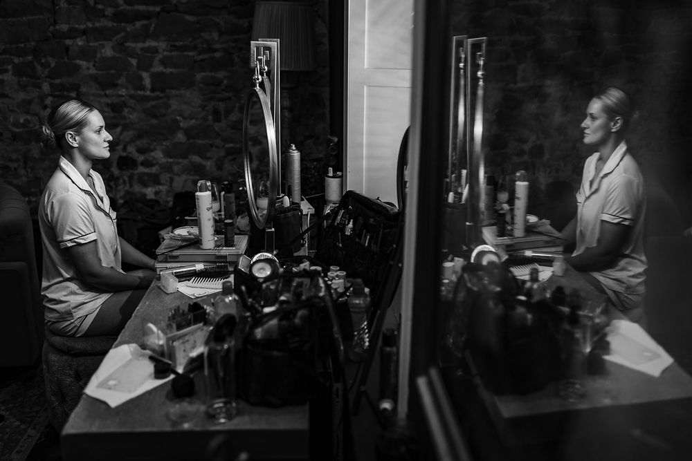 Black and white photos showing behind-the-scenes moments at a professional event.