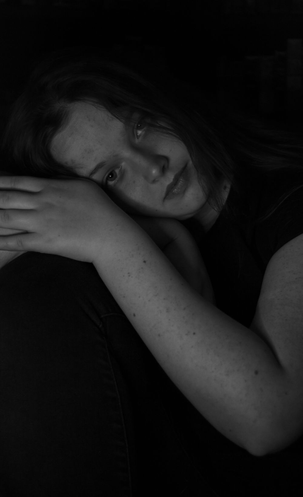 Artistic black and white photography series with dramatic shadows and intimate poses.