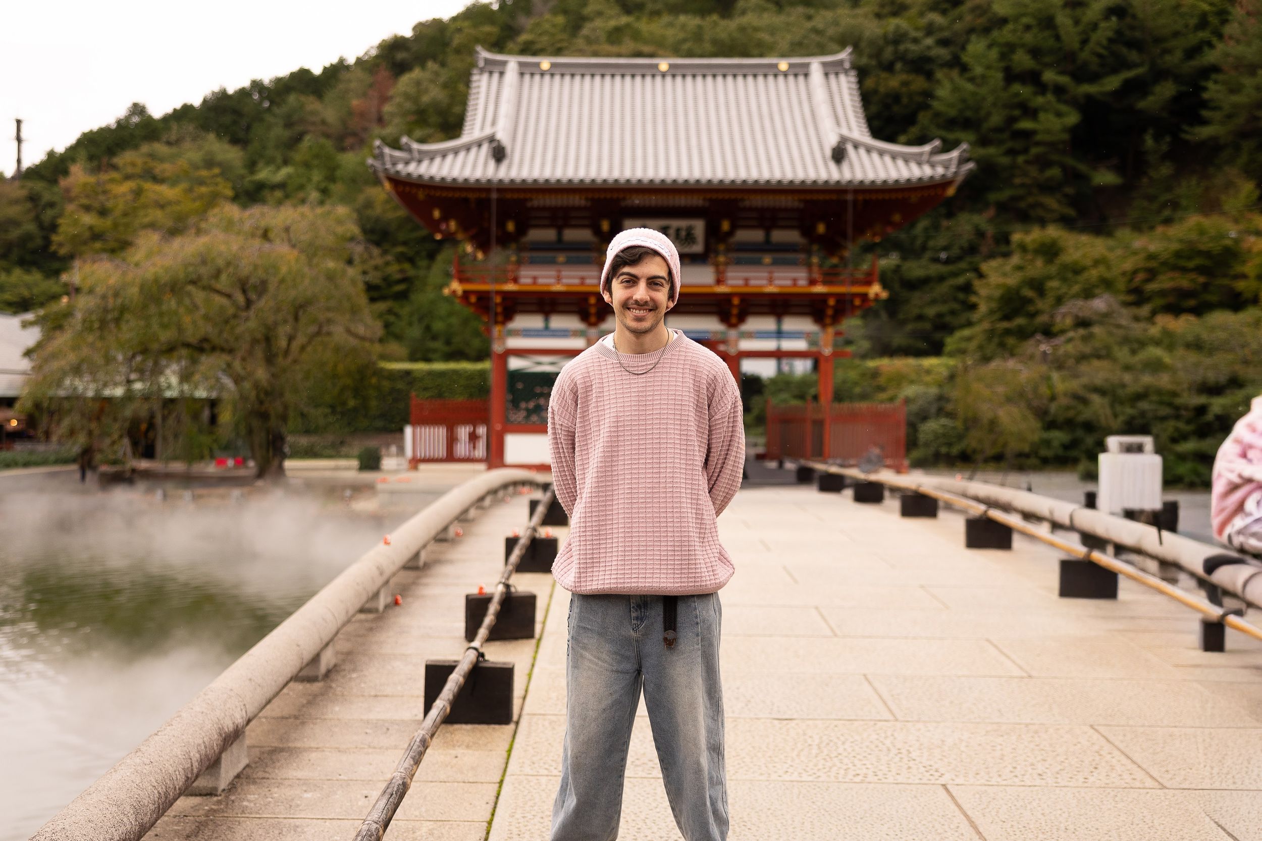 A series of connected photos showing a traditional Japanese temple pathway and architecture in a scenic setting.