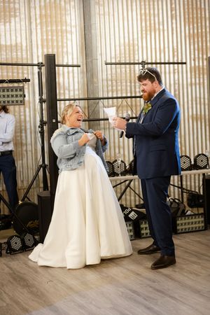 First look wedding sequence showing emotional reaction at outdoor venue during wedding photo session.