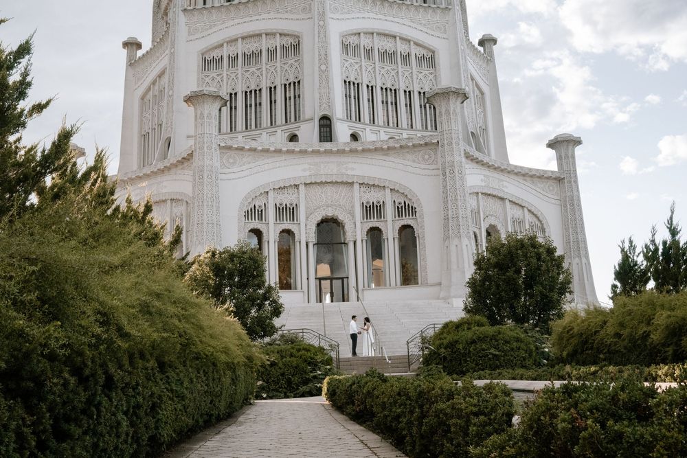 A sequence of exterior images capturing the majestic white Bahai House of Worship temple in Wilmette, Illinois.