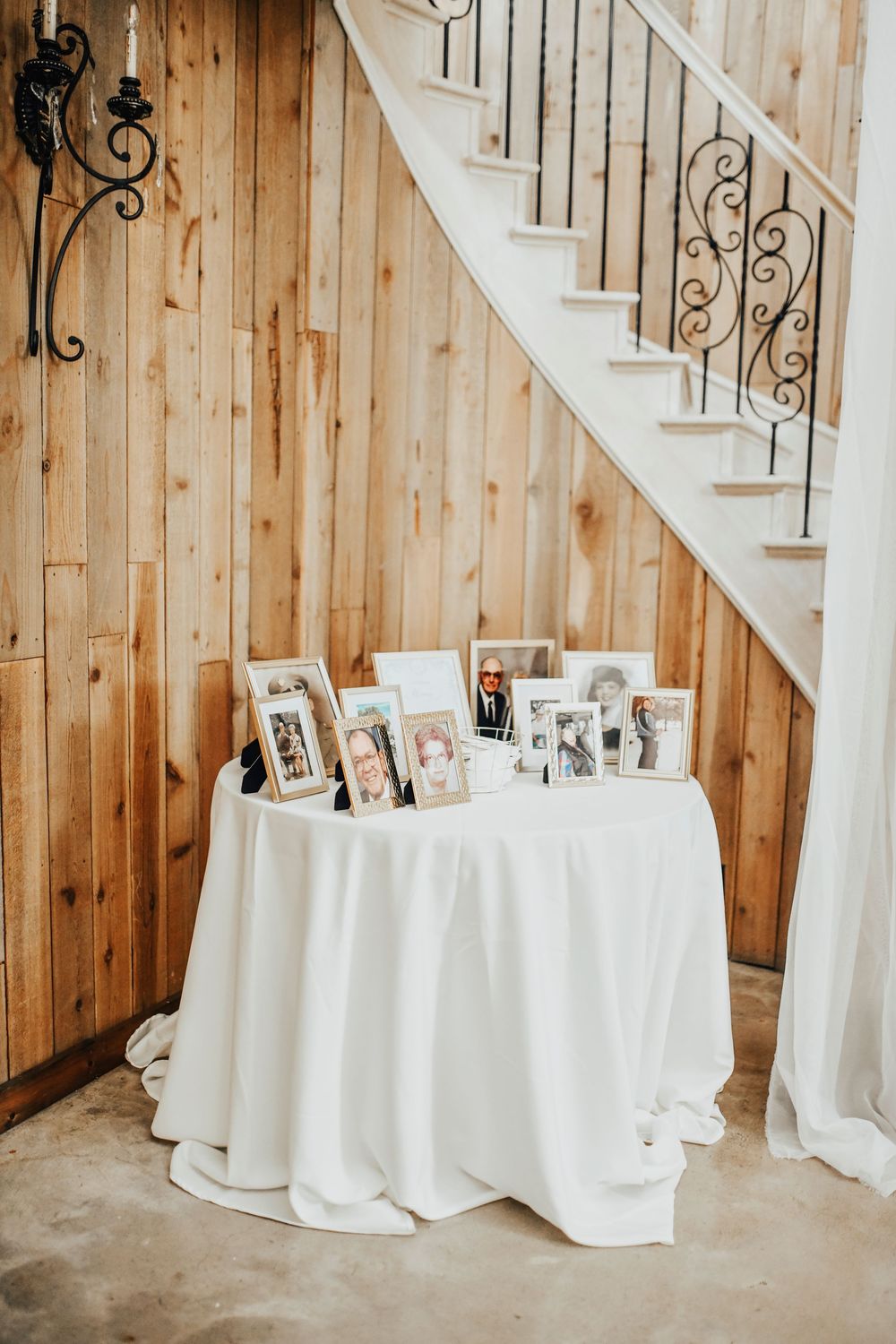 Bride’s personalized wedding decor inside Whispering Oaks barn .