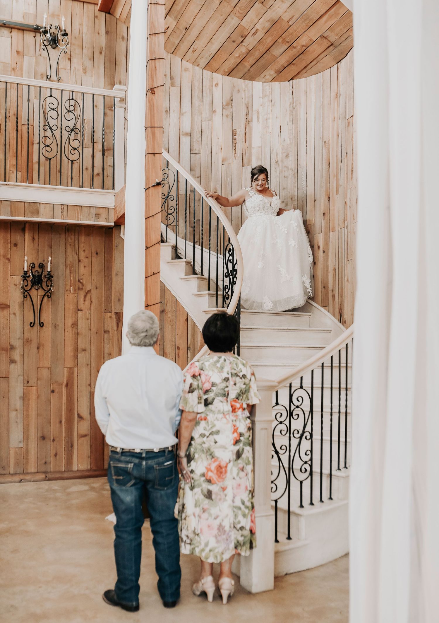 Whispering Oaks bride descending stairs for first look