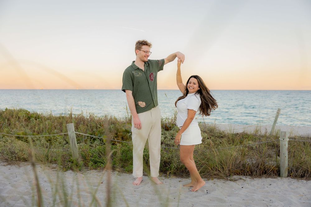 spin picture during engagement shoot at Hollywood North beach park