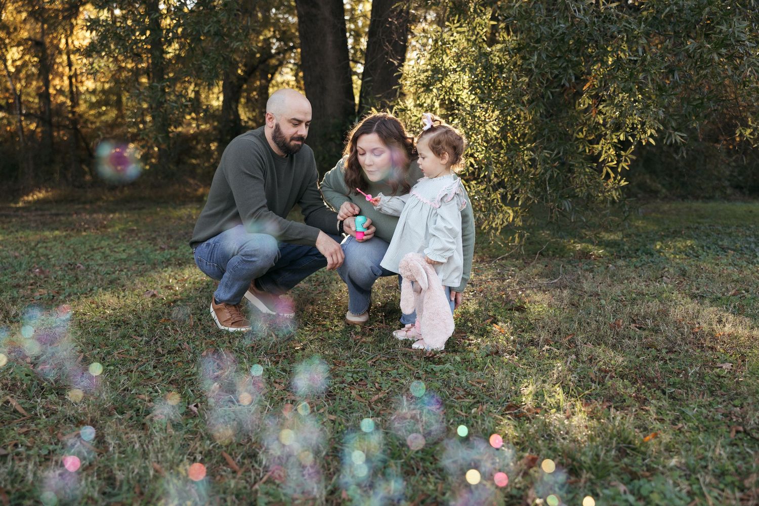 A couple shares tender moments in a field of yellow wildflowers during a romantic outdoor photoshoot.