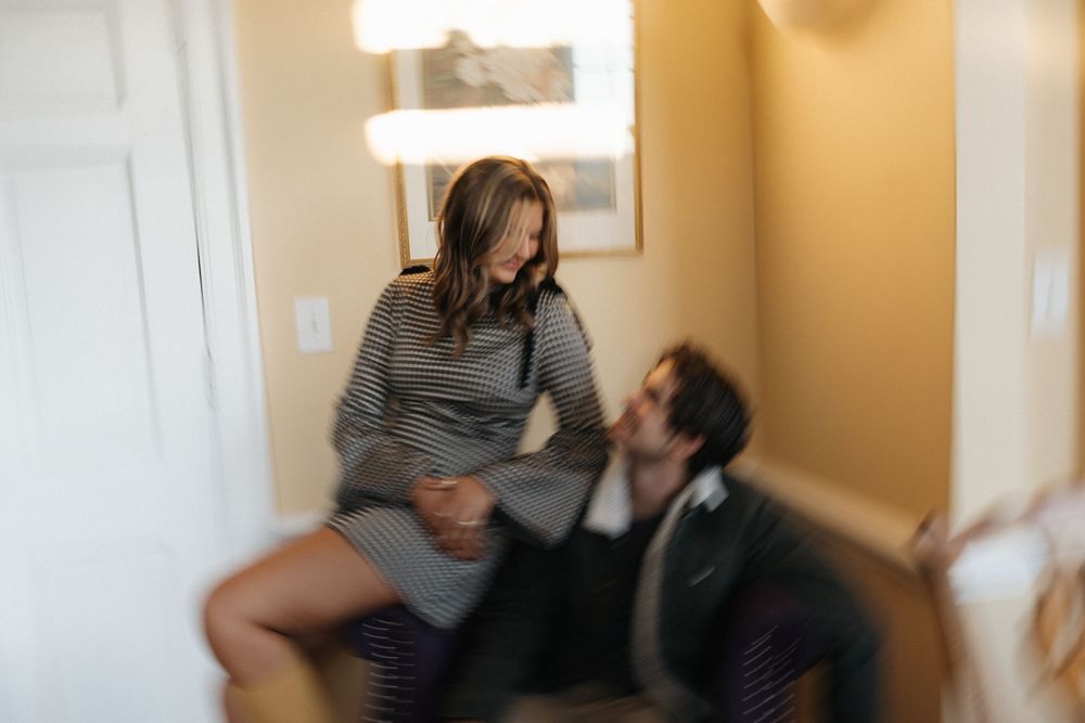 A series of four connected photos showing two people dancing together in a warm-lit room.